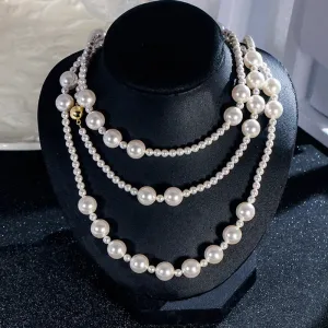 1 -JC - Women’s Pearl Necklace: 1.6m shell pearls, silver buckle, wear multiple ways