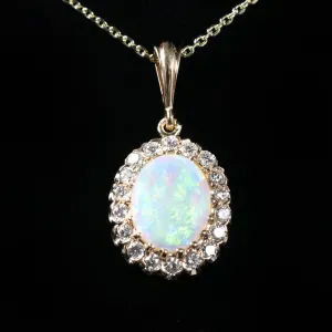 14k Yellow Gold 1.19 Carat Opal and Diamond Pendant