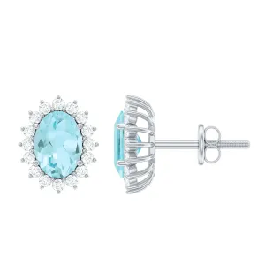 1.75 CT Oval Sky Blue Topaz Classic Stud Earrings with Diamond Halo