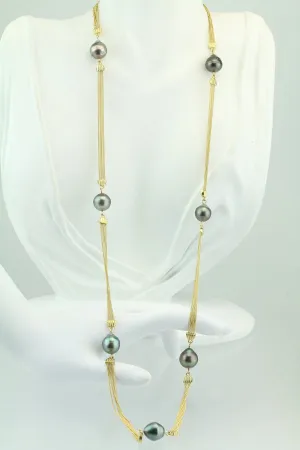 18KT Yellow Gold Cook Island Pearl 7 Station Necklace 28.5"