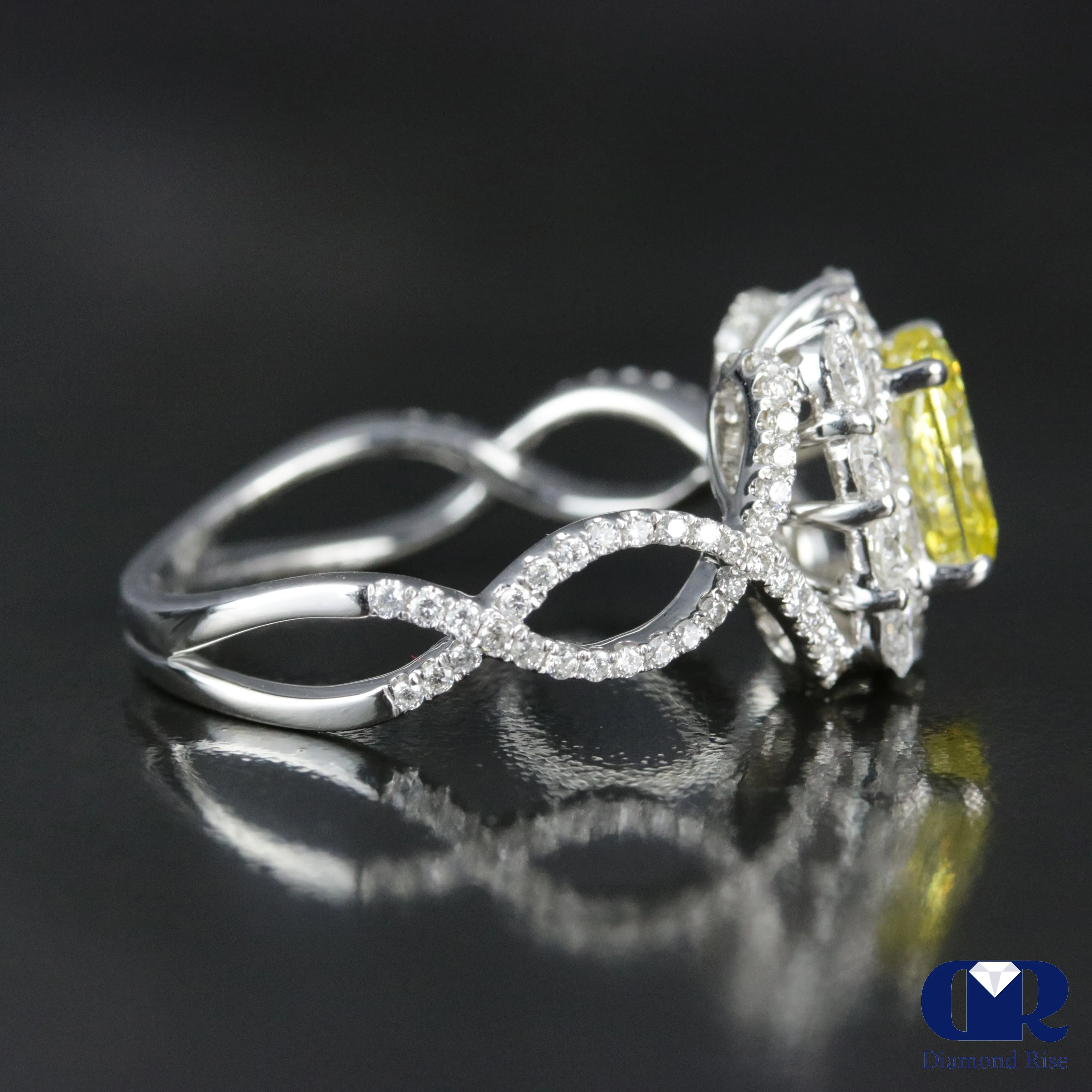 2.45 Carat Fancy Yellow Cushion Cut Diamond Twisted Engagement Ring In 18K White Gold