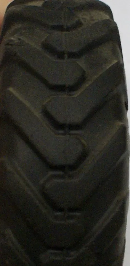 4-1/2' x 1-1/2" hard rubber toy tire. Original.