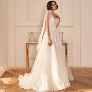 A-Line Sexy Backless V Neck Sleeveless Wedding Dress Luxury Spaghetti Straps Ribbons Sweep Train Bridal Gown