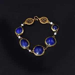 A Victorian Bracelet set with five ancient Egyptian Lapis Lazuli Scaraboids, 18th Dynasty, ca 1550 - 1295 BCE