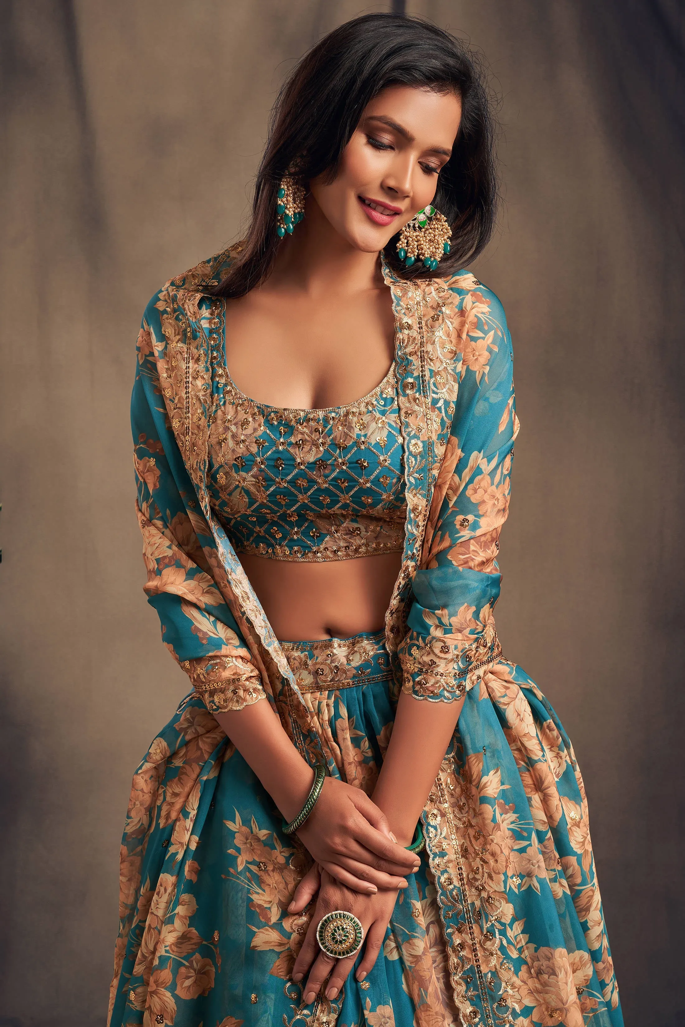 Accomplishing Teal Blue Zari Embroidery Organza Occasional Wear Lehenga Choli