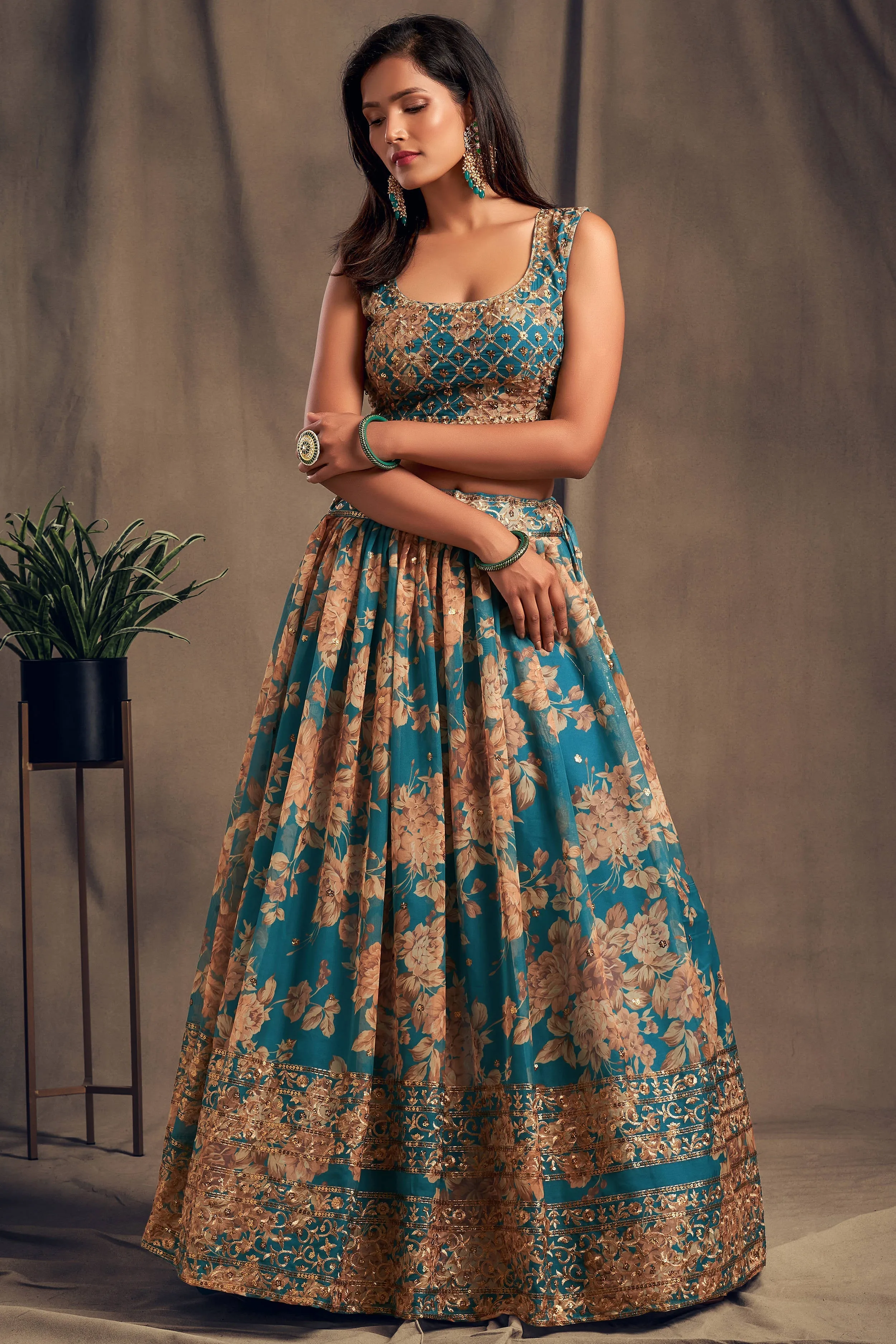 Accomplishing Teal Blue Zari Embroidery Organza Occasional Wear Lehenga Choli