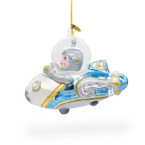 Adventurous Astronaut Driving Spaceship - Blown Glass Christmas Ornament