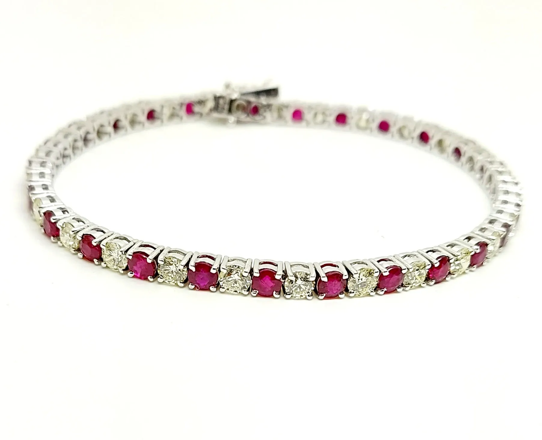 Alternating Size Ruby and Diamond Bracelet in 14k White Gold