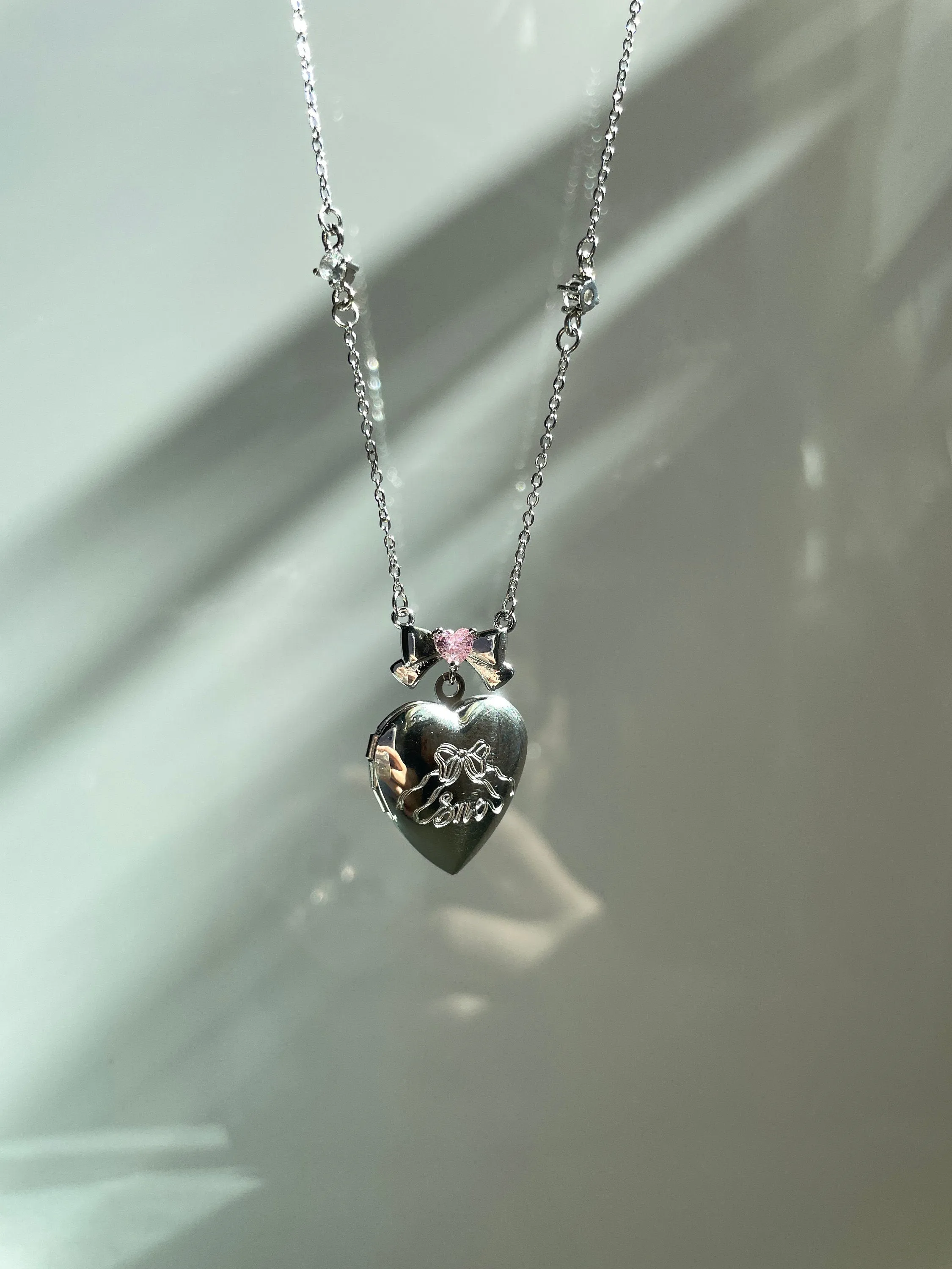 Angelica Coquette Bow Heart Locket Necklace