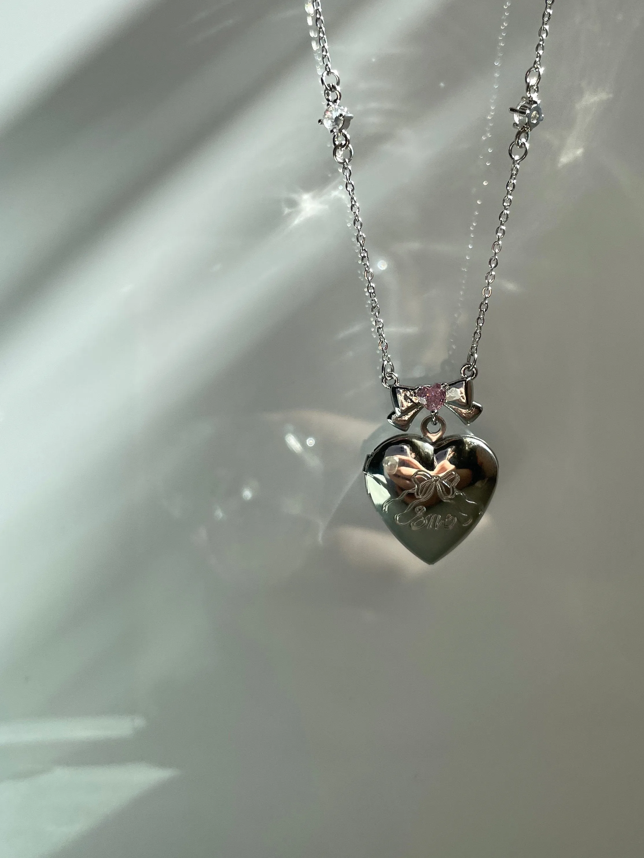 Angelica Coquette Bow Heart Locket Necklace