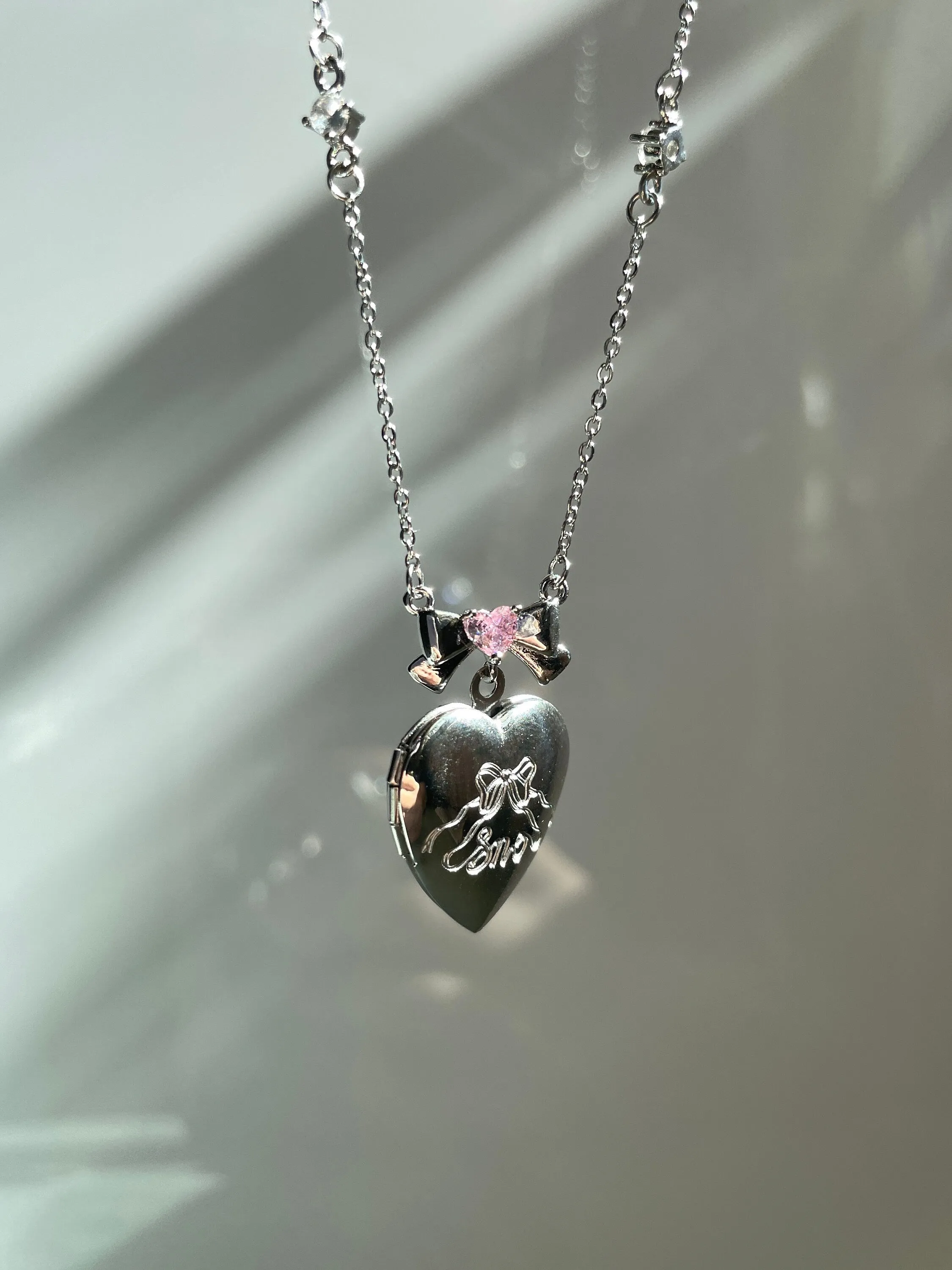 Angelica Coquette Bow Heart Locket Necklace