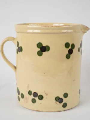 Antique French pitcher - yellow w/ spots 9½"