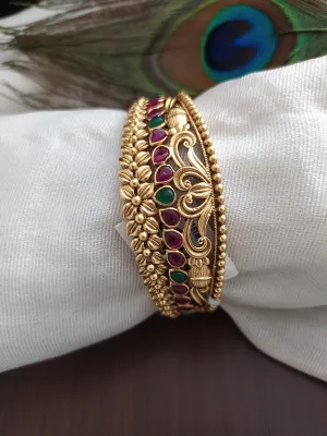 Antique Kada with floral Design with Kemp Stones having ruby and green color