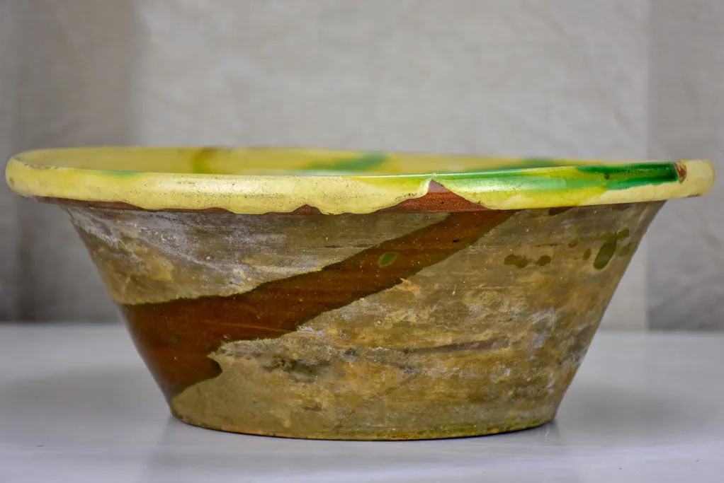 Antique Spanish bowl with yellow and green glaze