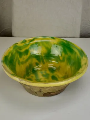 Antique Spanish bowl with yellow and green glaze