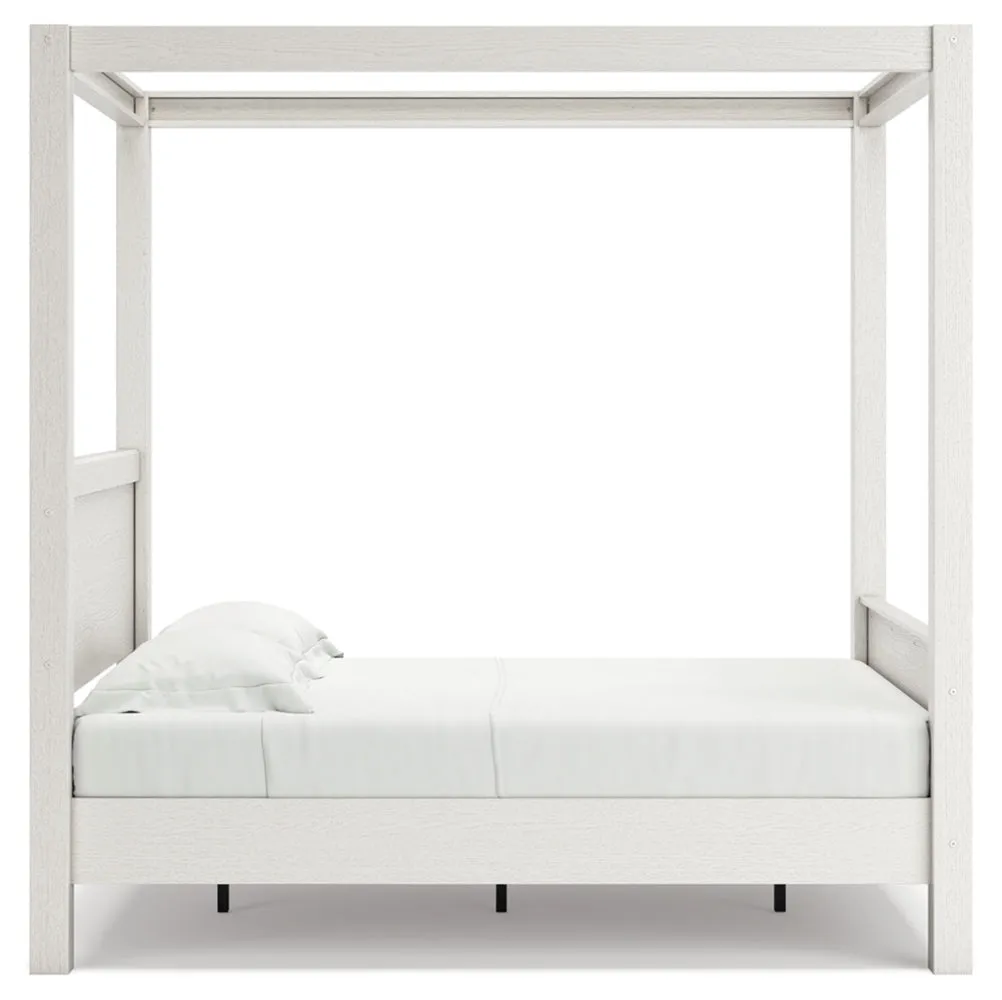 Aprilyn Full Canopy Bed with Dresser and 2 Nightstands