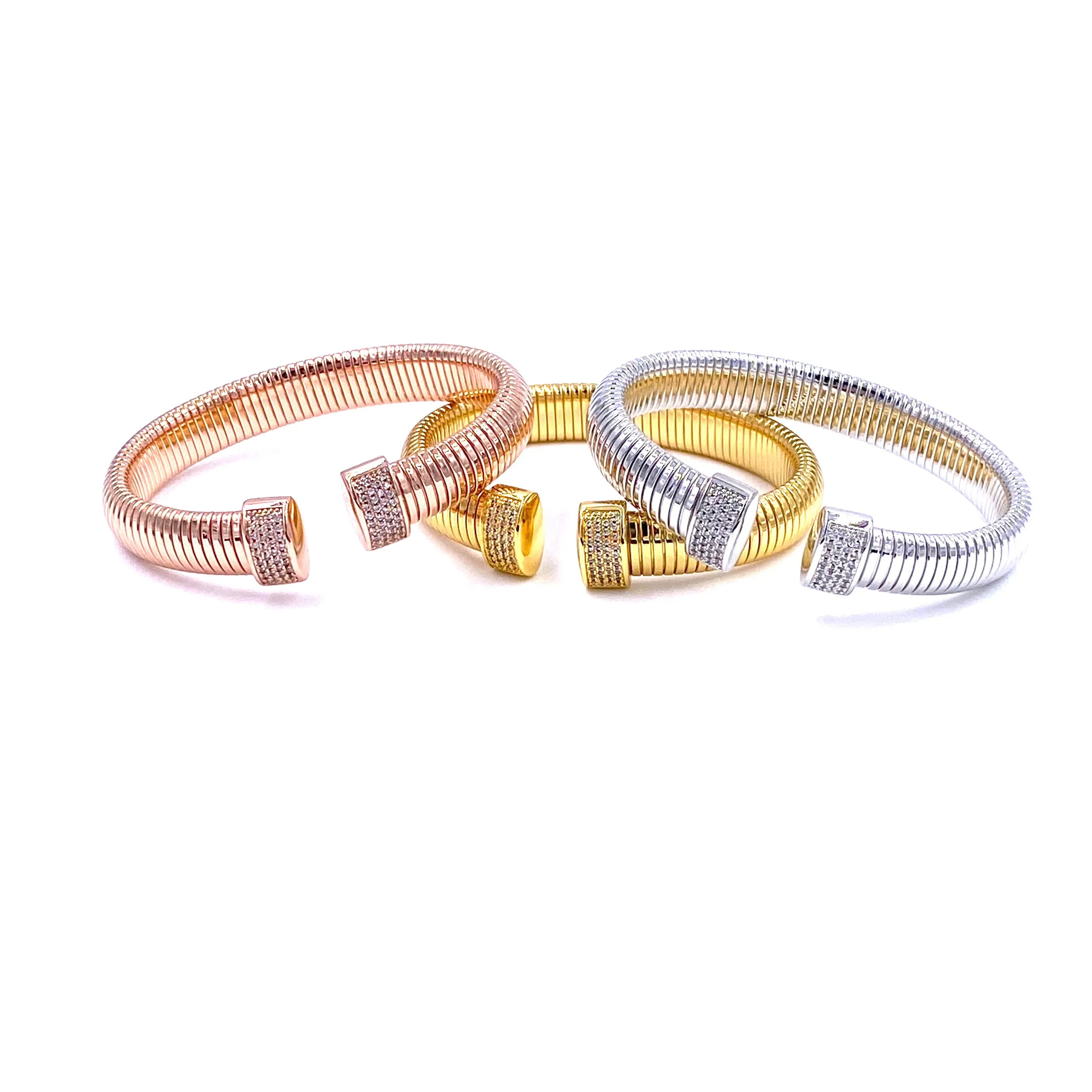 Ashley Gold Stainless Steel Slinky Design CZ Open Bangle