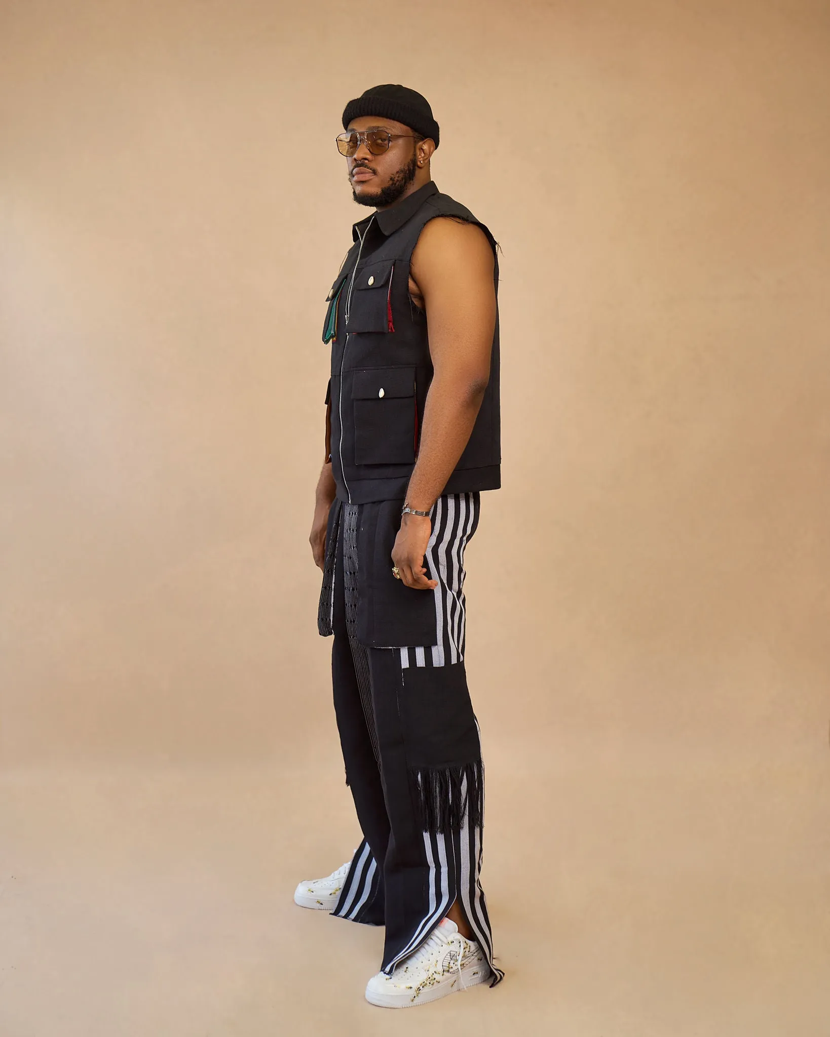 Aso oke sleeveless jacket and patch cargo pant