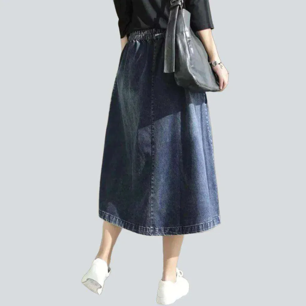 Asymmetric denim skirt with rubber