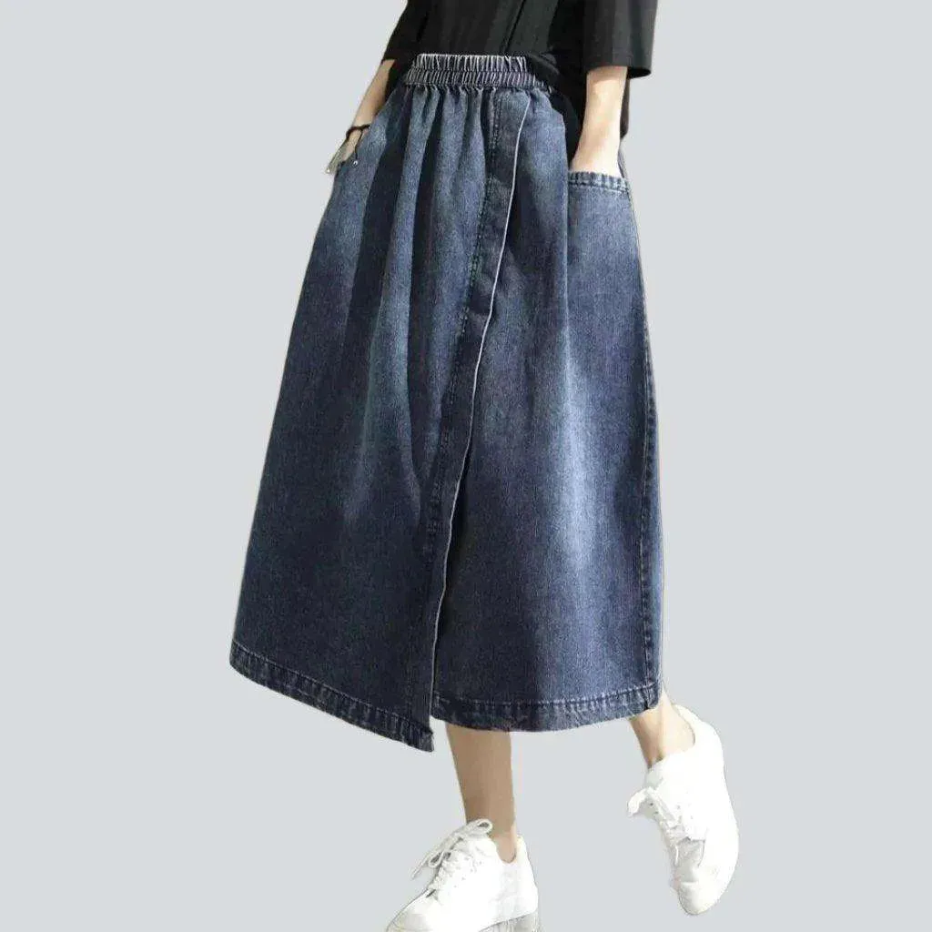 Asymmetric denim skirt with rubber