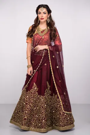 Attractive Maroon Colored Partywear Designer Embroidered Silk Lehenga Choli