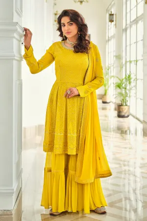 Attractive Yellow Gharara Style Embroidered Peplum Suit