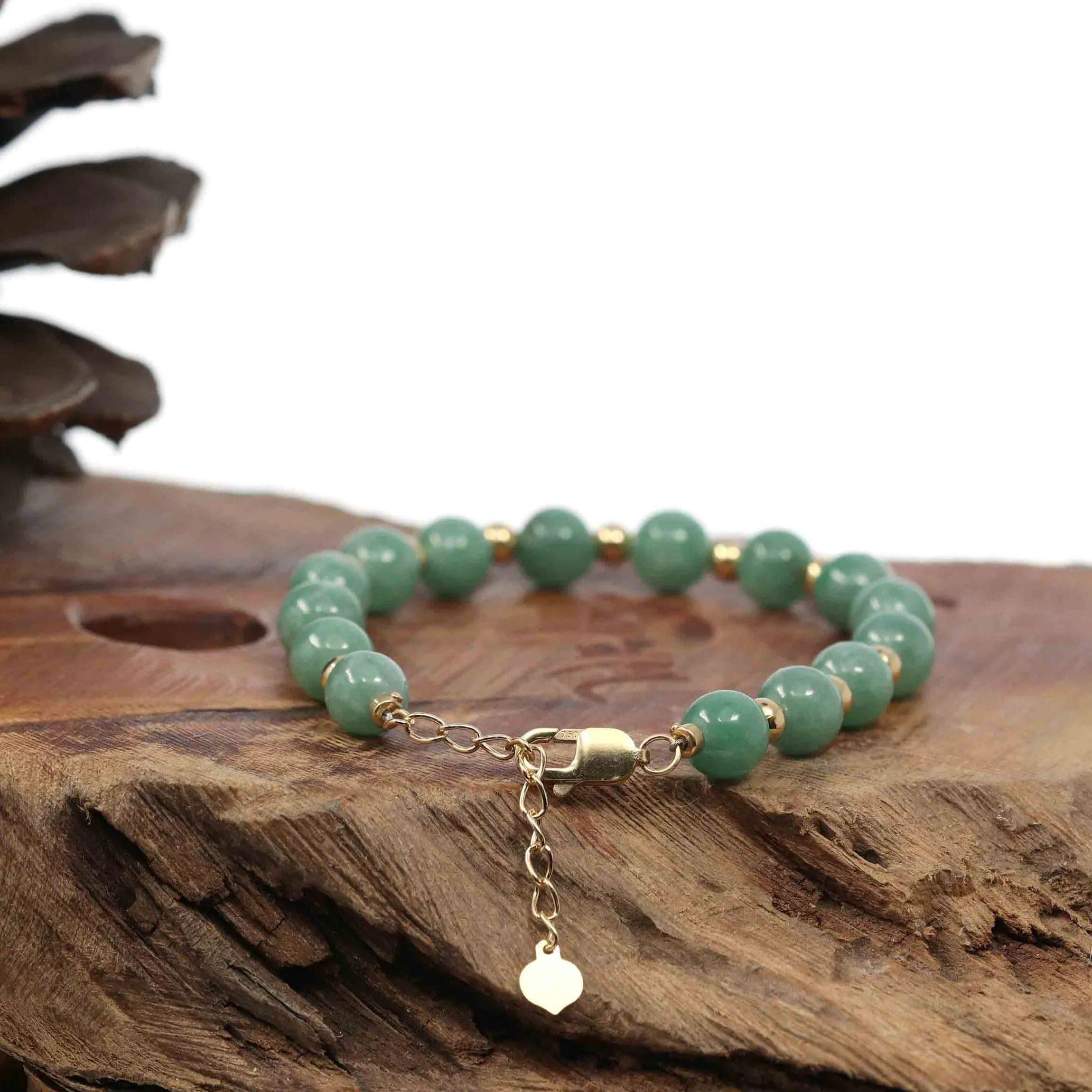 Baikalla Genuine Green Jadeite Jade Round Beads Bracelet With 18K Yellow Gold Clasp and Gold Beads ( 7 mm )