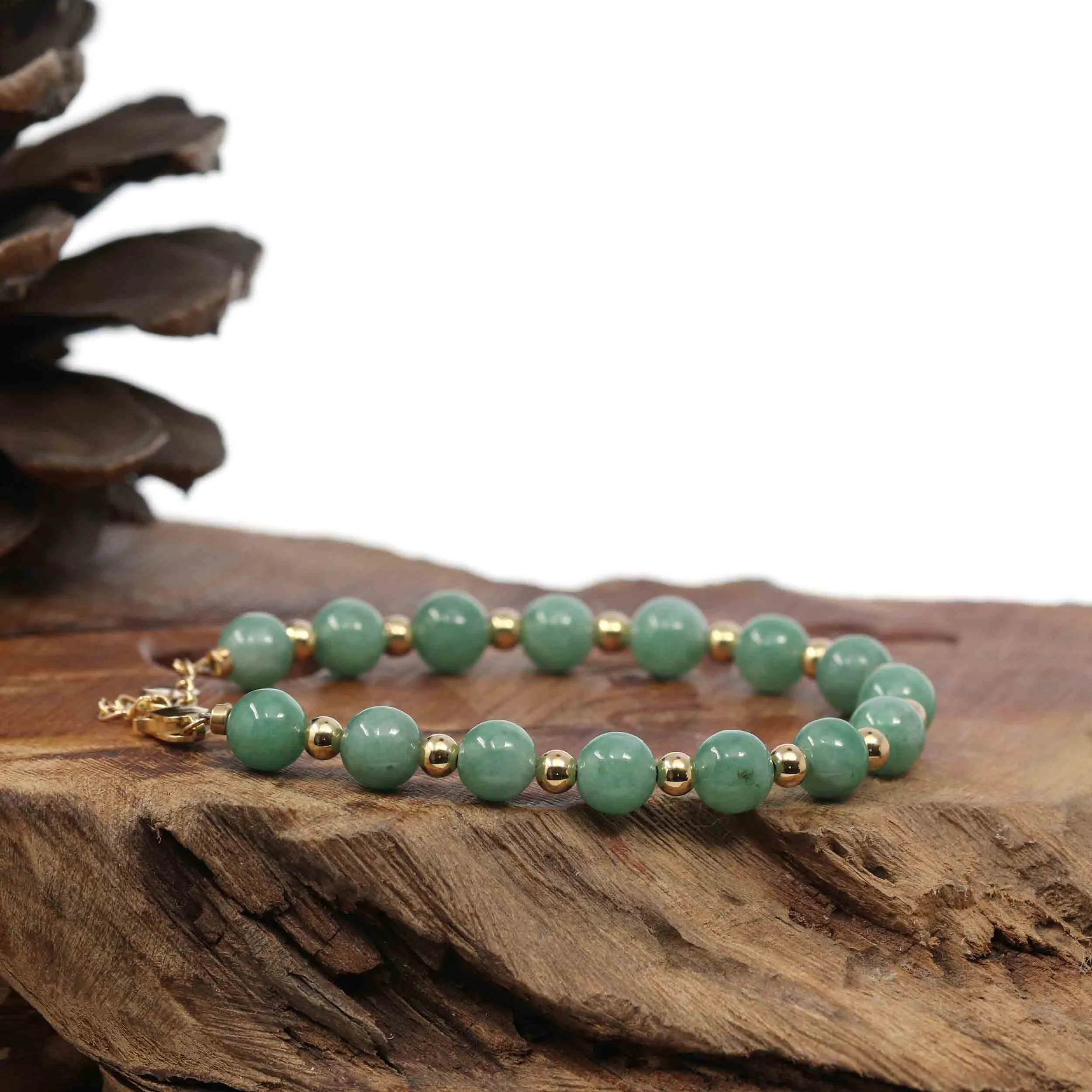 Baikalla Genuine Green Jadeite Jade Round Beads Bracelet With 18K Yellow Gold Clasp and Gold Beads ( 7 mm )