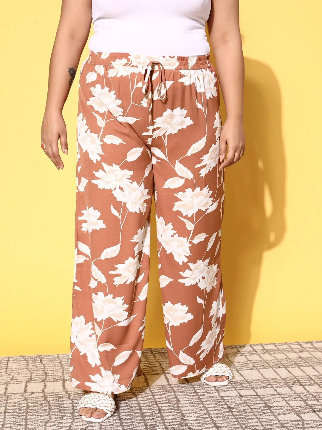 Berrylush Women Plus Size Brown & White Floral Printed Drawstring High-Rise Waist Woven Regular Trousers