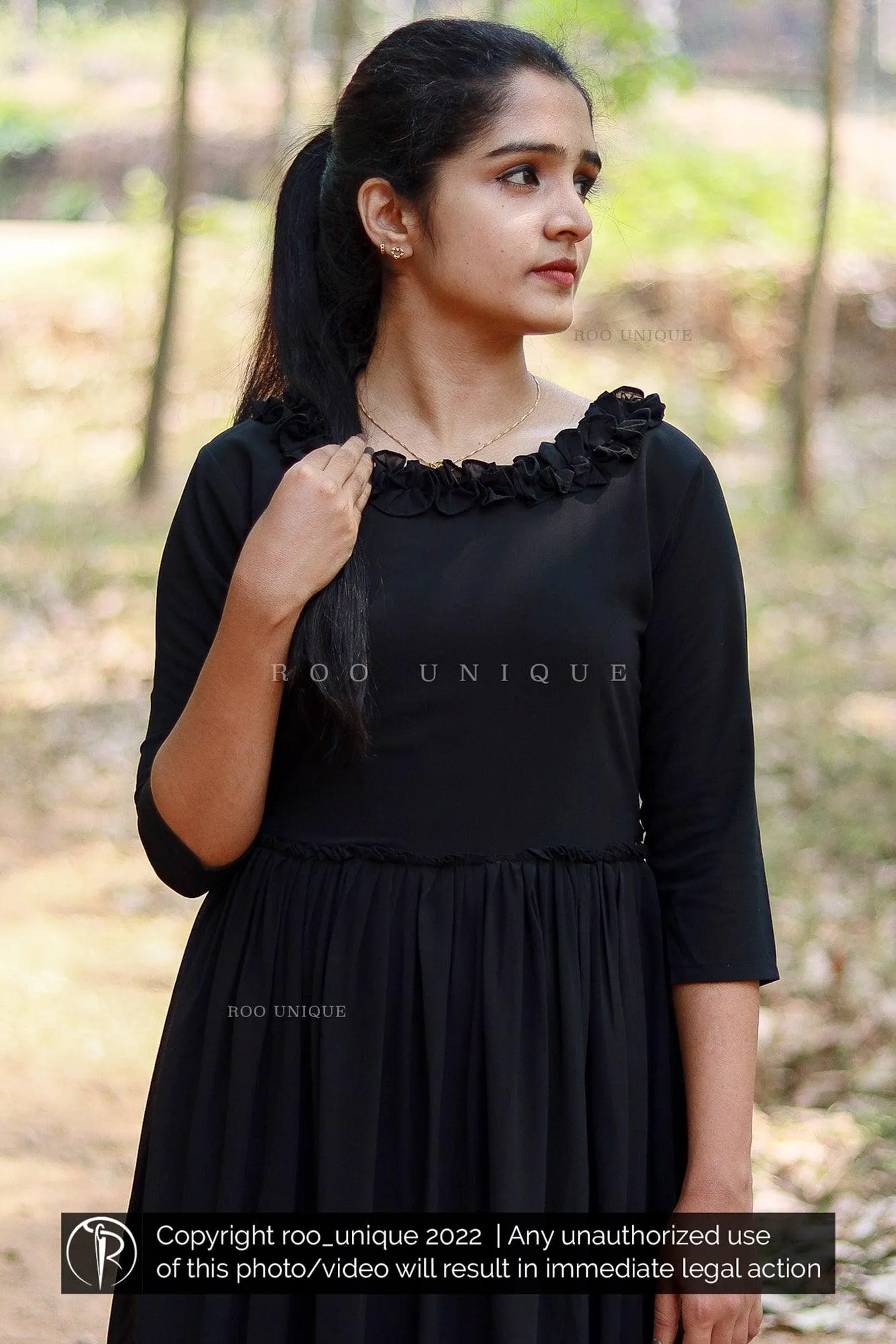 Black Dress With Frilled Neck And Waist Gathering