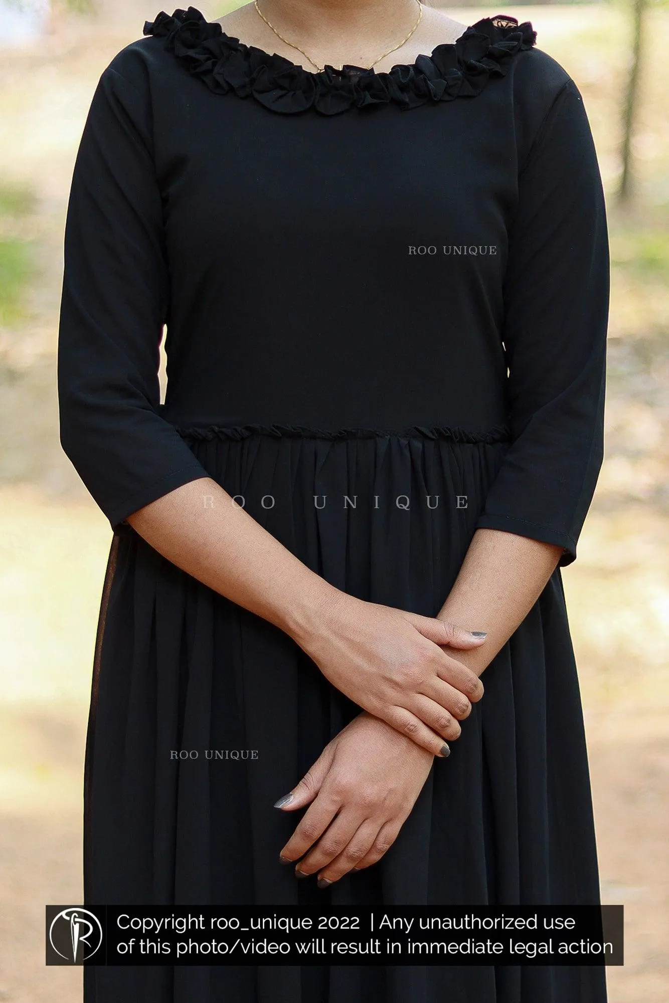 Black Dress With Frilled Neck And Waist Gathering