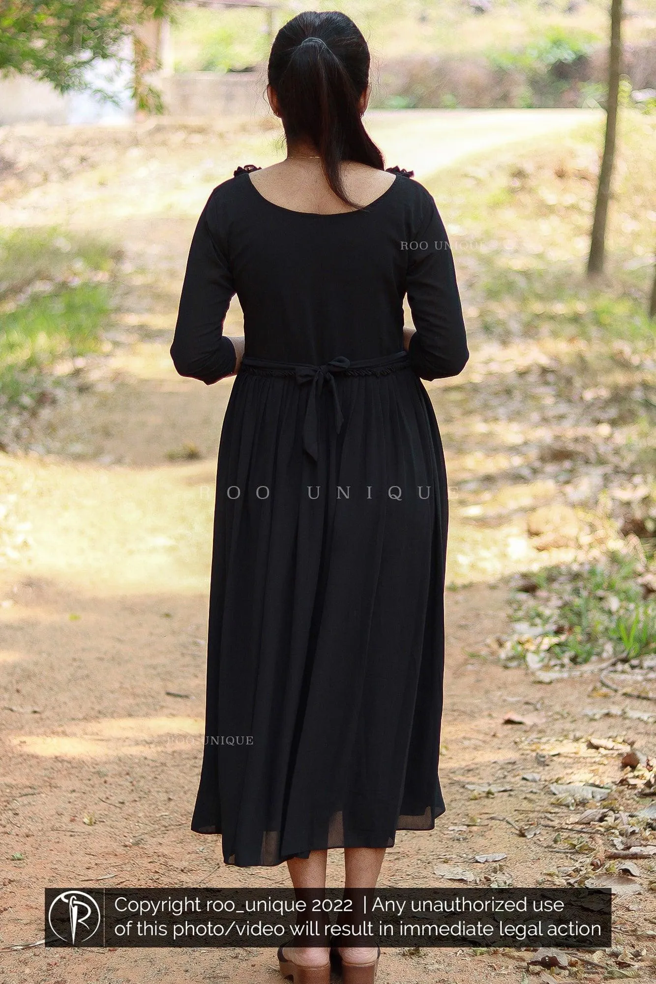 Black Dress With Frilled Neck And Waist Gathering