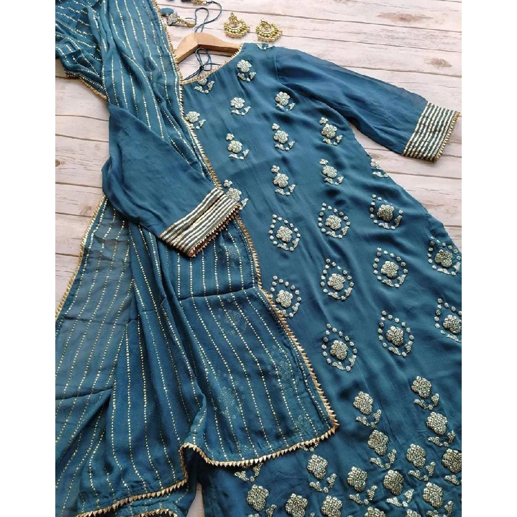 Blue colored Kurti with Butta work and net Dupatta