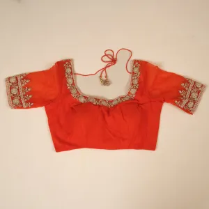 Bright orange stitched blouse