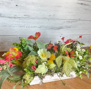 Butterfly and poppies centerpiece