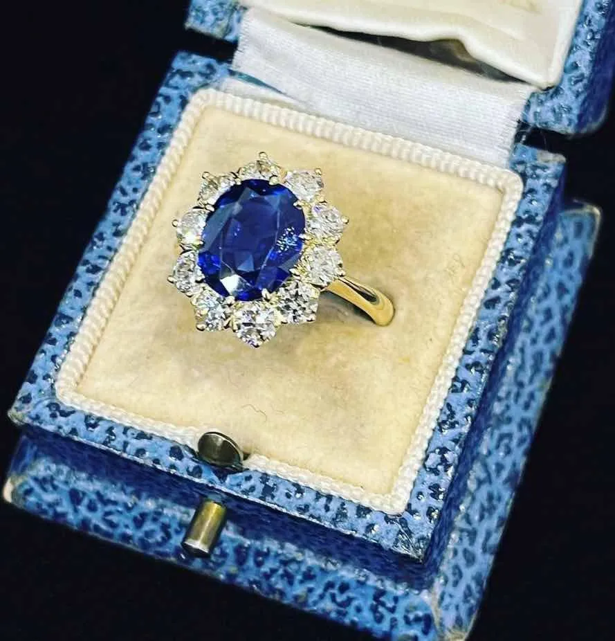 Ceylon Sapphire and Diamond Oval Cluster Ring