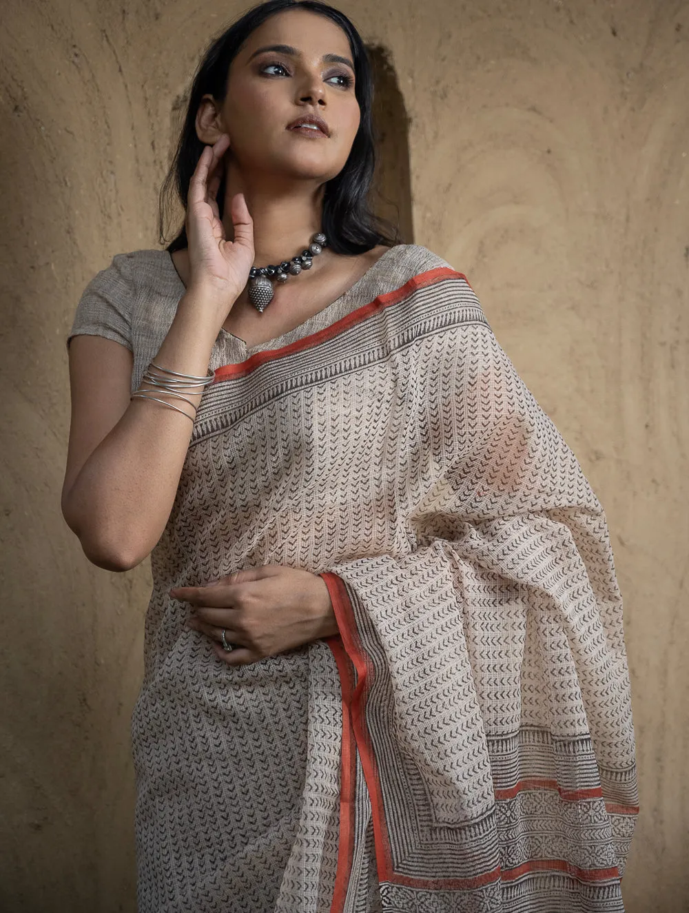 Classic Appeal. Bagru Hand Block Printed Kota Doria Saree - Beige Elegance