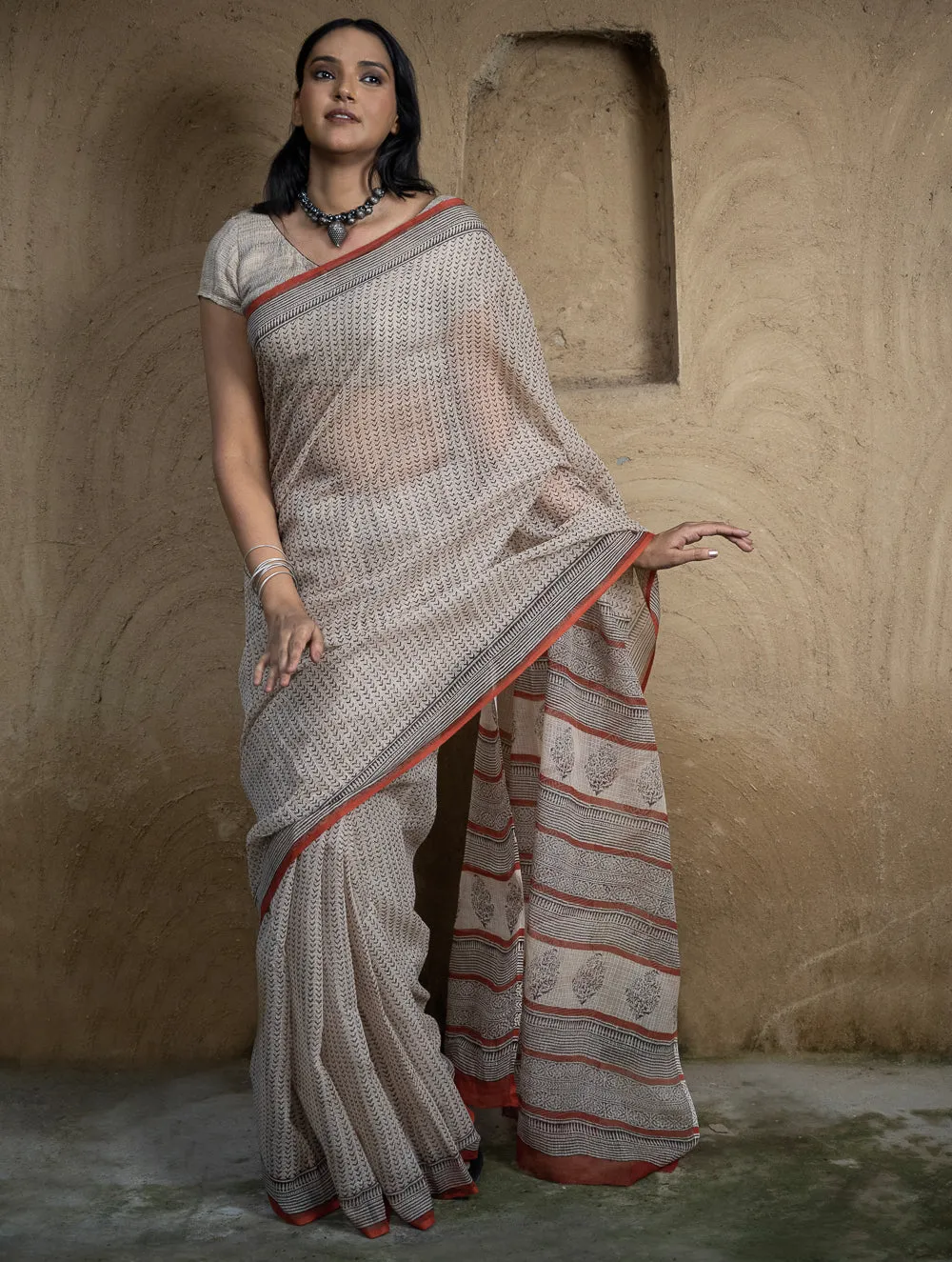 Classic Appeal. Bagru Hand Block Printed Kota Doria Saree - Beige Elegance