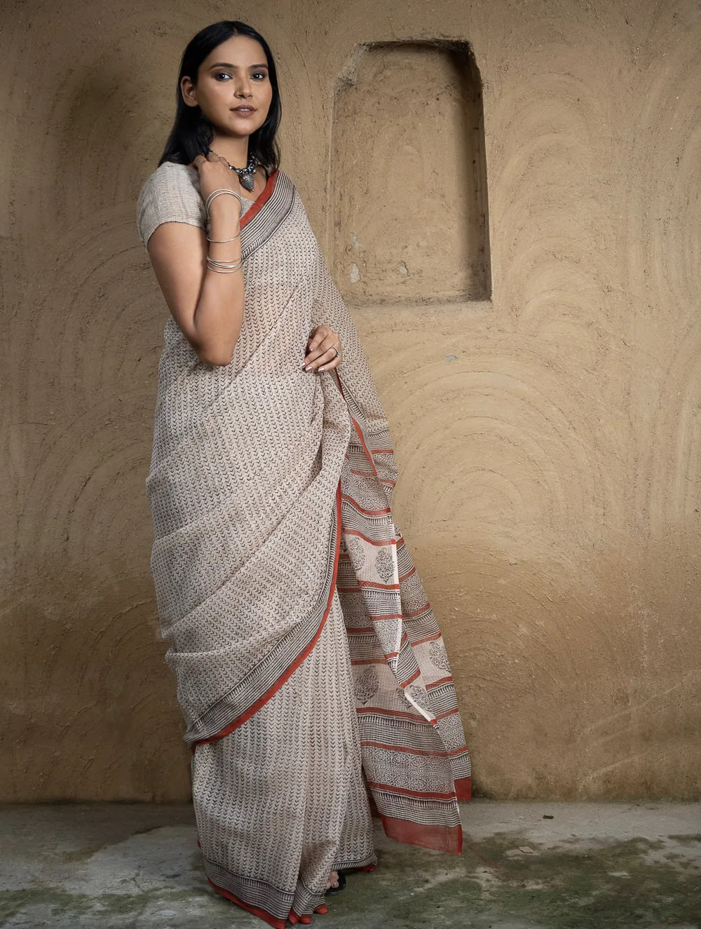 Classic Appeal. Bagru Hand Block Printed Kota Doria Saree - Beige Elegance