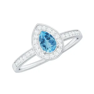 Classic Sky Blue Topaz Engagement Ring with Diamond Halo