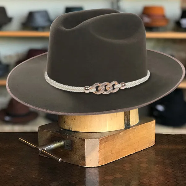 Classic Wide-Brim Green Cowboy Hat with Elegant Silver Rope Band and Buckle