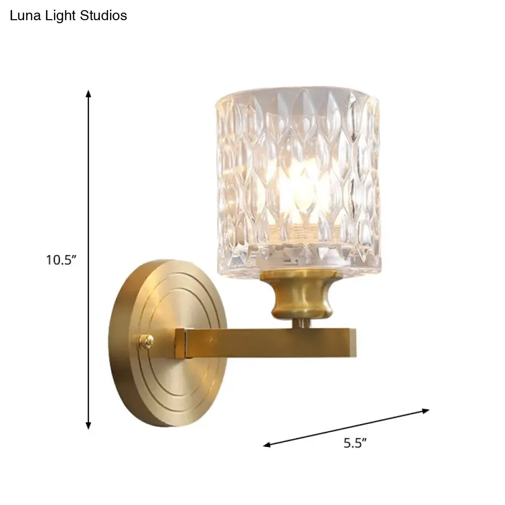 Contemporary Cylindrical Wall Light: Stylish Clear Dimpled Glass Design, Golden Wall Sconce for Bedroom