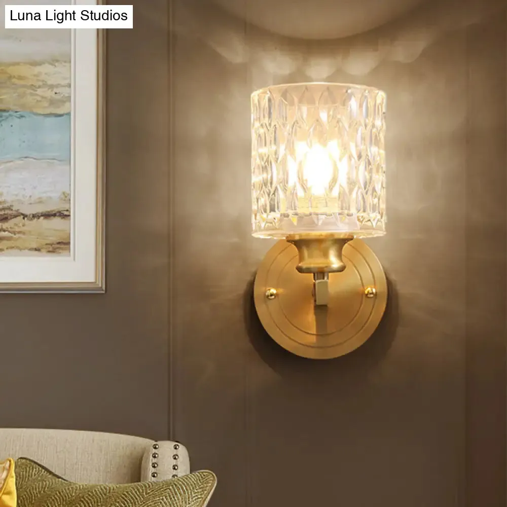 Contemporary Cylindrical Wall Light: Stylish Clear Dimpled Glass Design, Golden Wall Sconce for Bedroom