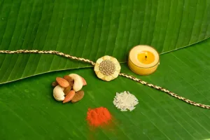 Cream Golden Embroidery Rakhi Set with Roli & Chawal - Handmade Designer Rakhi for Brothers