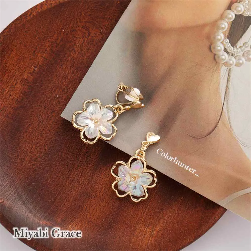 Dangle White Flower Gold Clip On Earrings