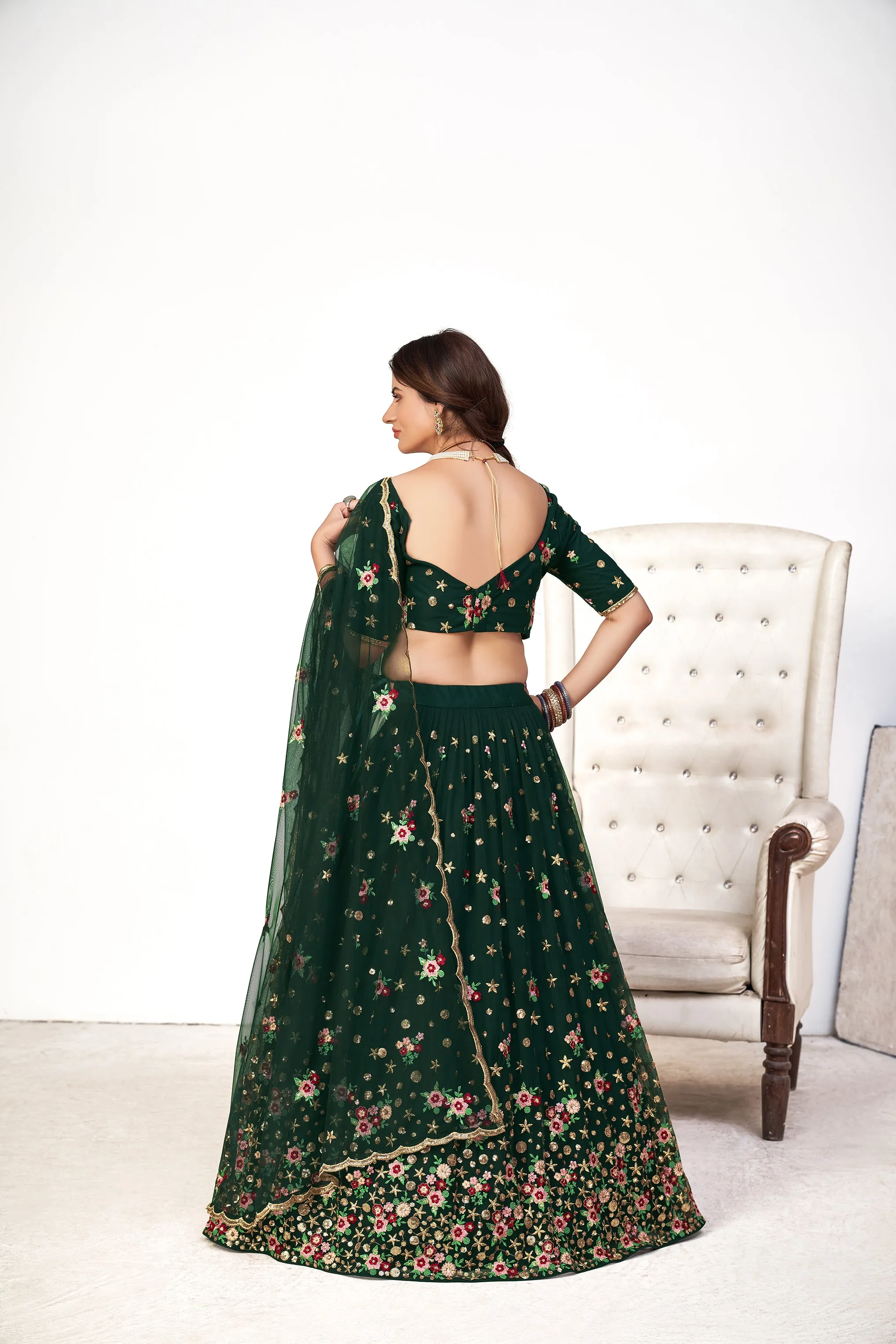 Delightful Green Net Thread And Sequins Embroidered Lehenga