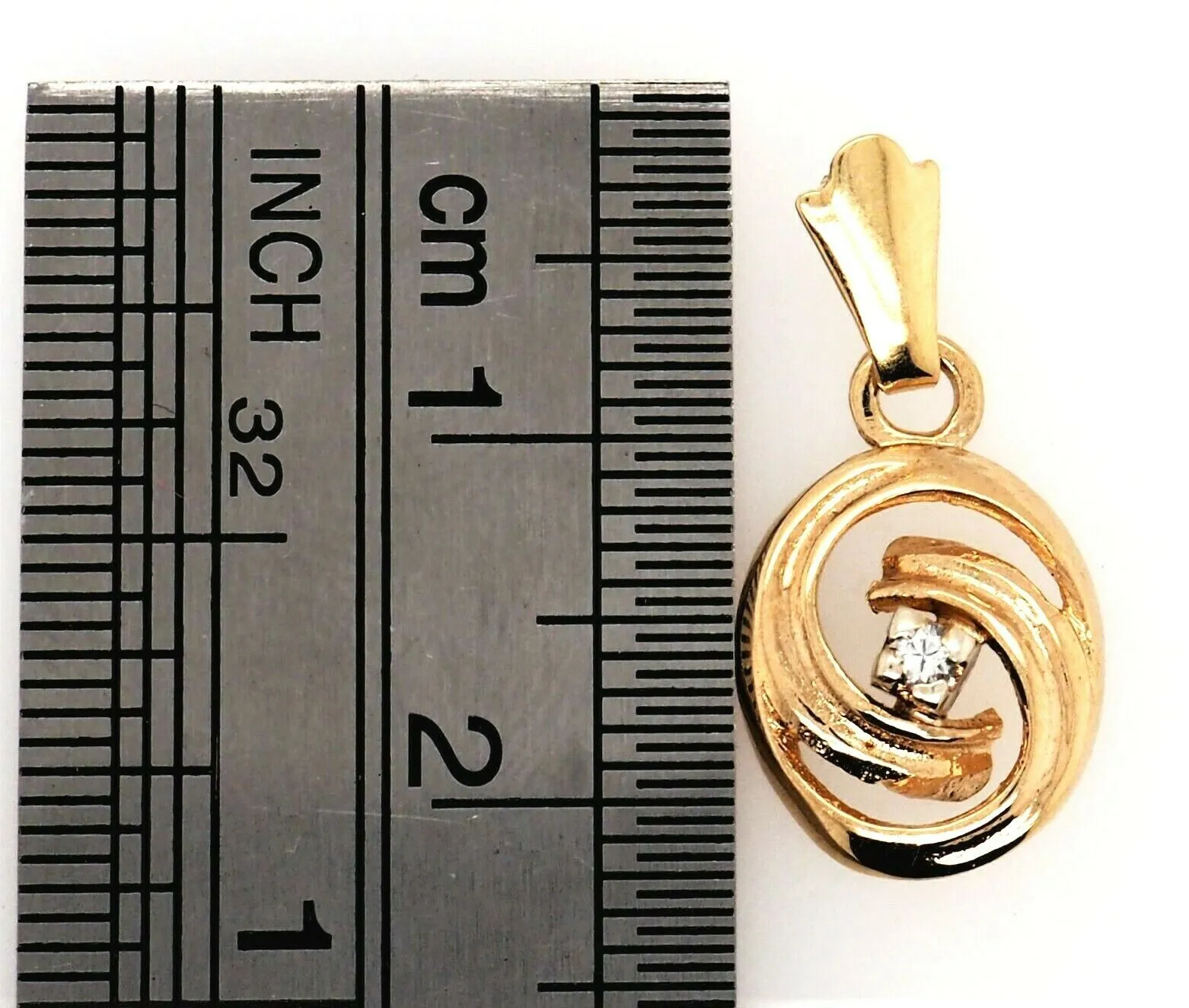 Diamond 9ct Yellow Gold Swirl Pendant