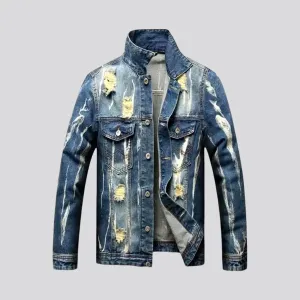 Distressed men's denim jacket