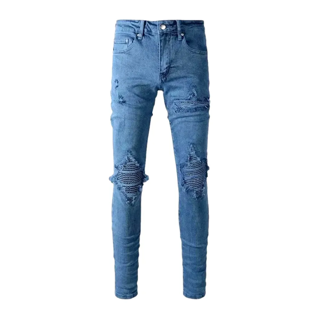 Distressed mid rise men's jeans