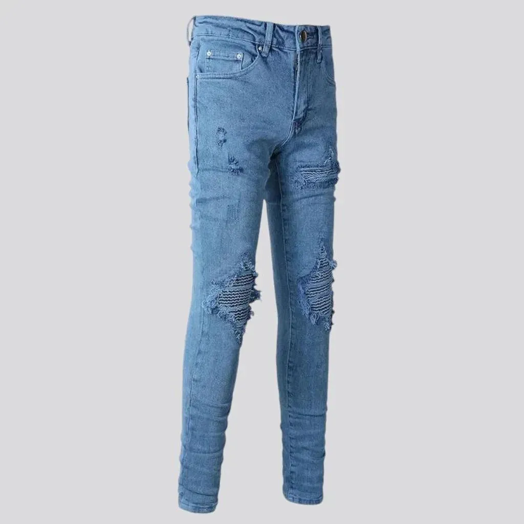 Distressed mid rise men's jeans